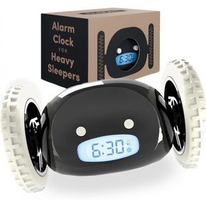 Black and White Alarm Clock on Wheels